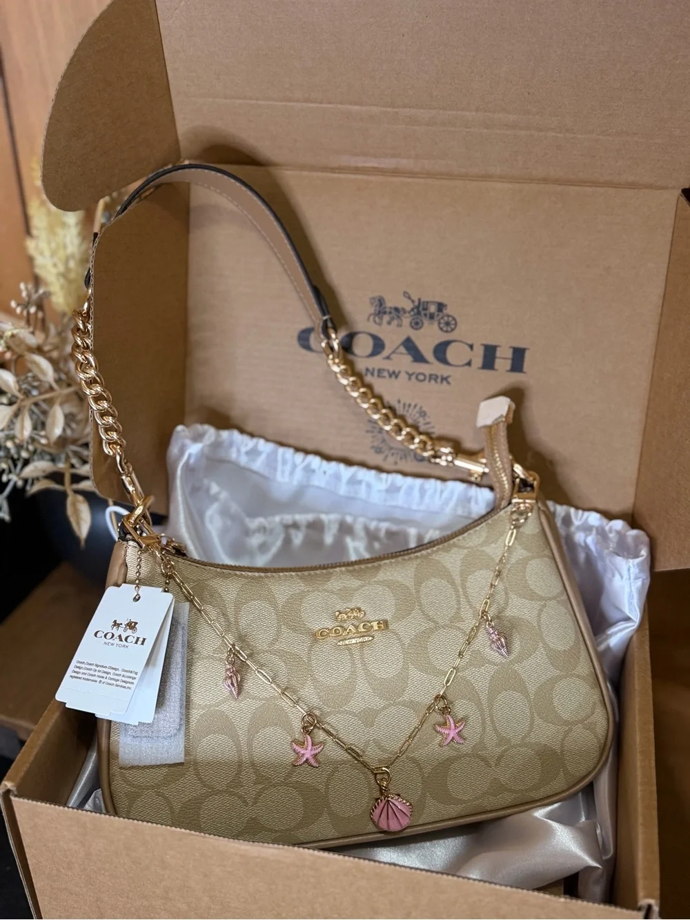 Coach Beige Signature Canvas Shoulder Bag with Pink Shell Charms